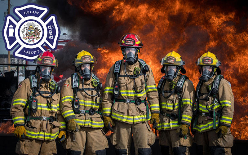 Calgary Firefighters standing in front of fire