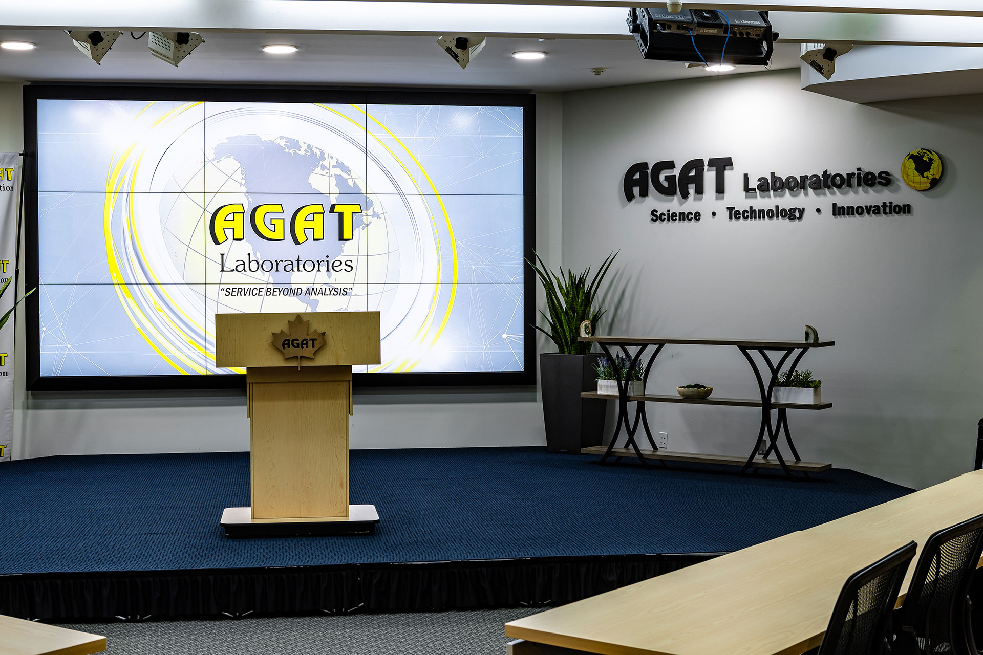 The Michael DeSanti Centre for Excellence stage with AGAT Laboratories brand screen on display.