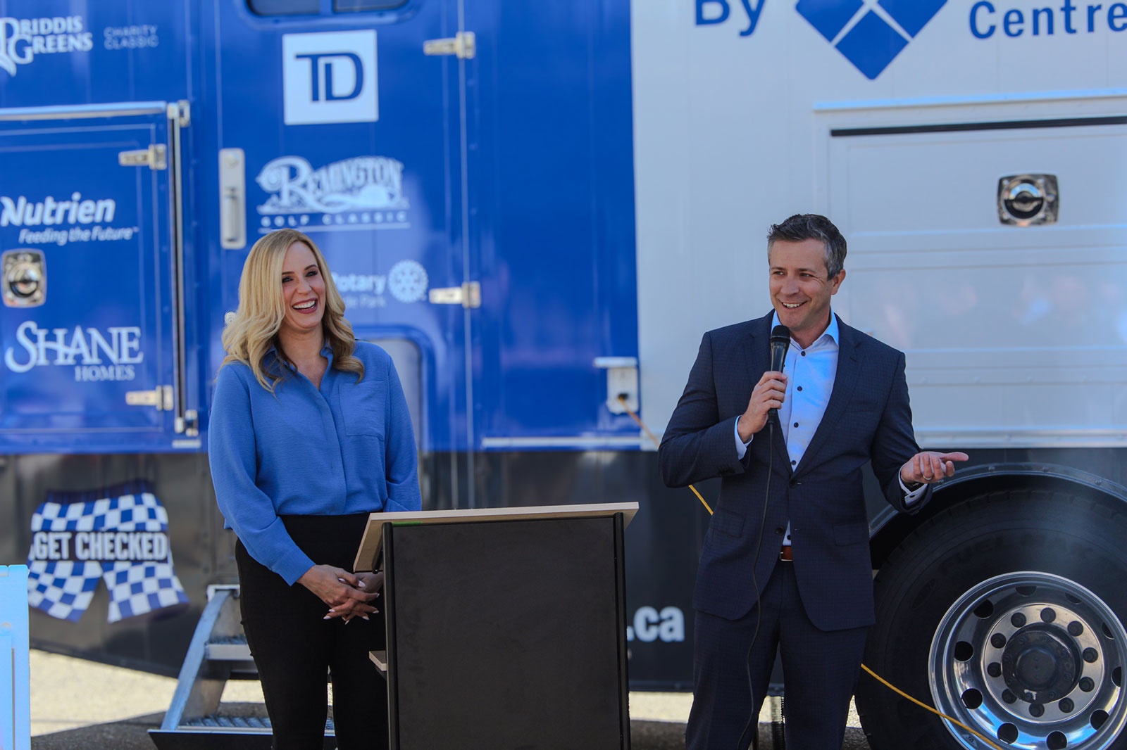 Marissa Reckmann and Jeff Davison speaking at MAN VAN® event.