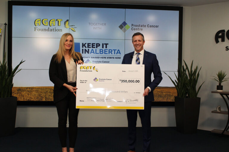 Marissa Reckmann, CEO of AGAT Laboratories, presenting a donation cheque to the Prostate Cancer Centre.